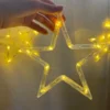 Dekorativne LED zvezde sa toplim svetlom stvaraju romantičan praznični ambijent