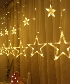LED padajuće zvezdice i zvezde žute stvaraju toplo i prijatno osvetljenje u prostoru