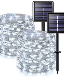Solarni panel sa belim LED svetlom puni se na suncu i osvetljava noću